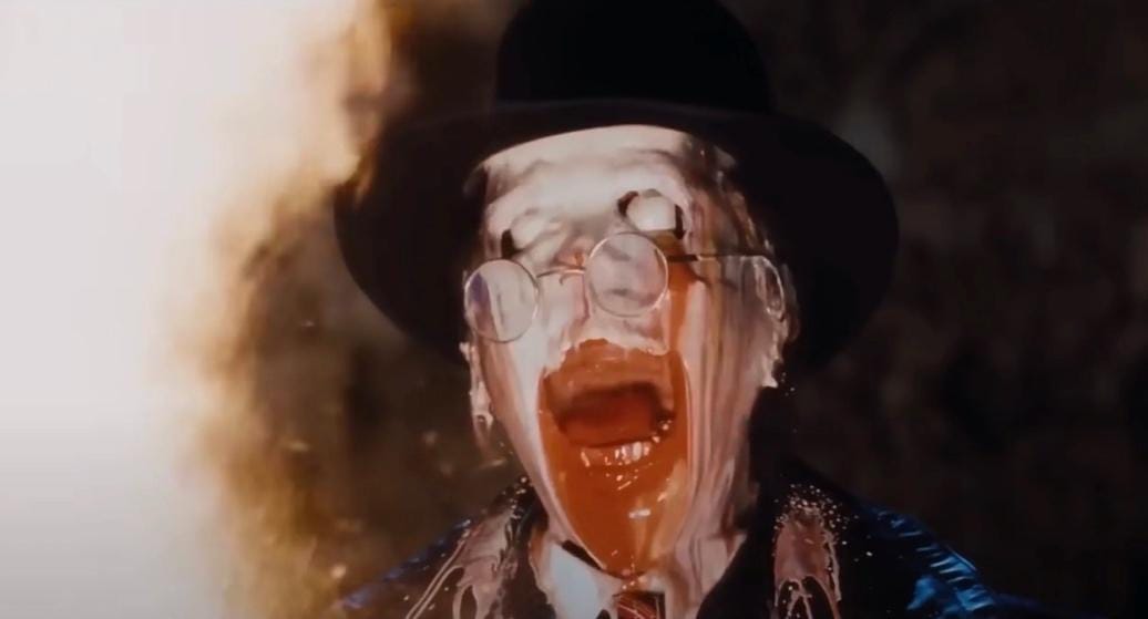 A person with white paint on his face

AI-generated content may be incorrect.